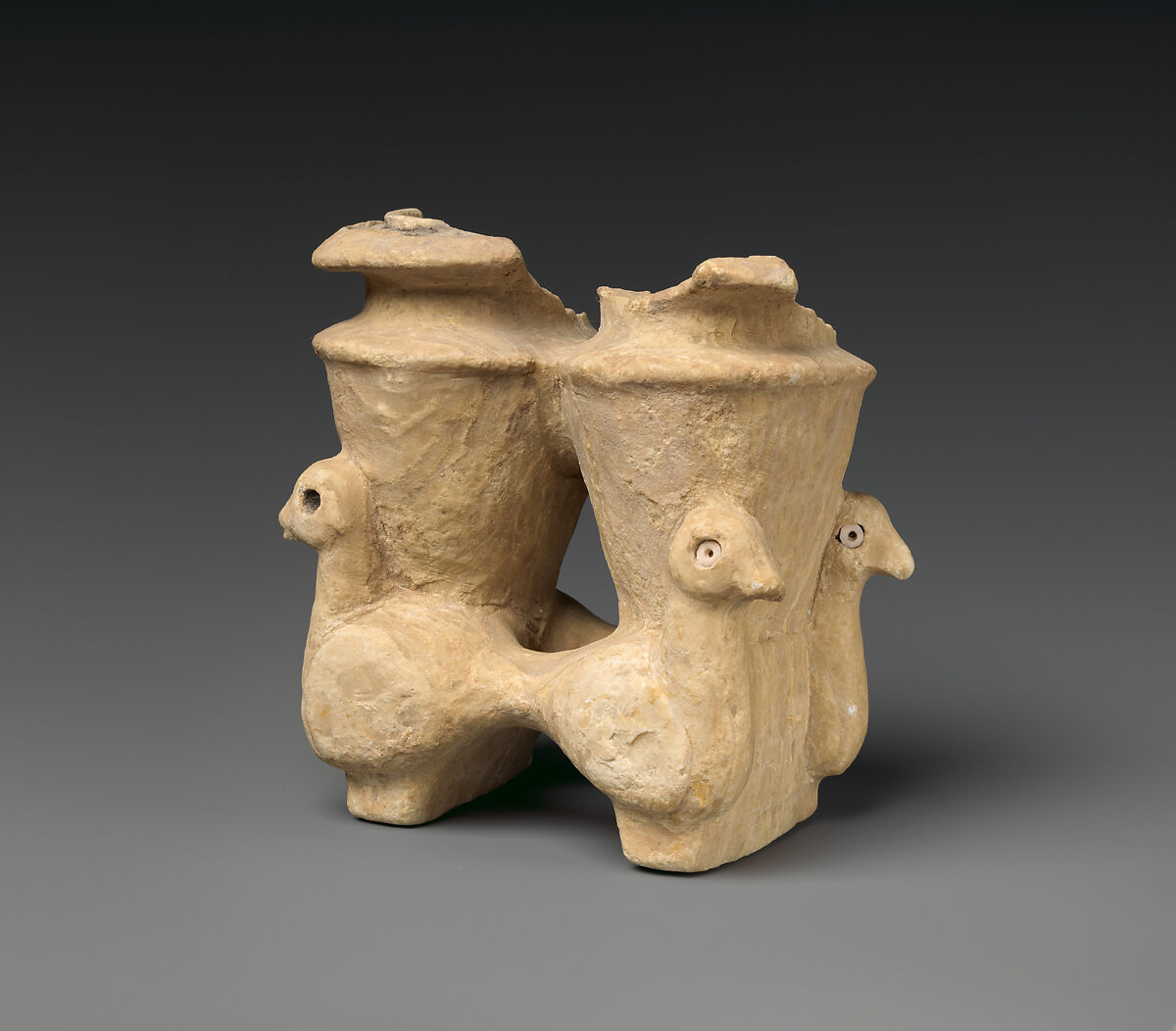 Double vessel with duck-shaped supports, Gypsum alabaster, shell inlay, bitumen, Sumerian 