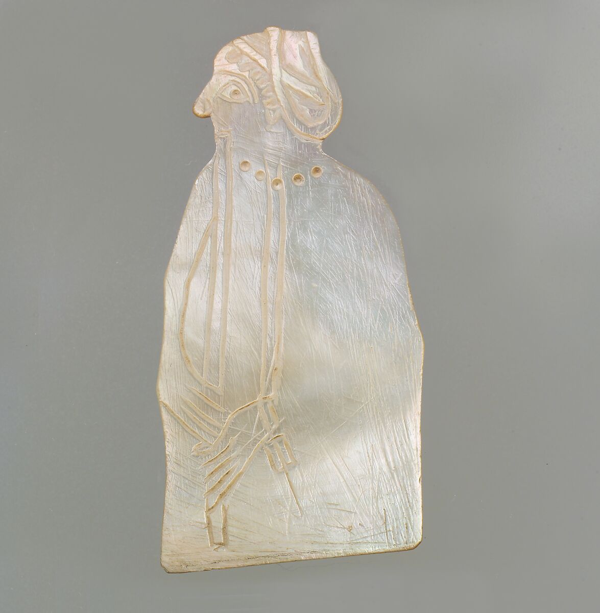 Inlay: woman wearing a cylinder seal, playing a flute, Shell, Sumerian 