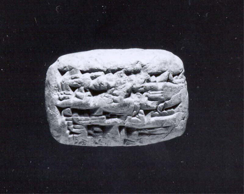 Cuneiform tablet impressed with two cylinder seals: administrative record, Clay, Assyrian 
