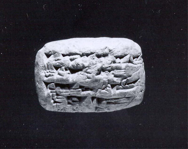 Cuneiform tablet impressed with two cylinder seals: administrative record