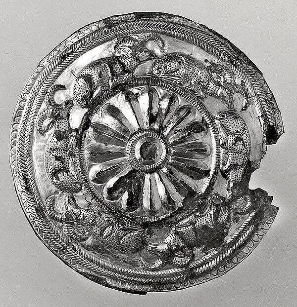 Roundel with a rosette and recumbent horned animals, Gold, silver foil, bronze, bitumen, Elamite