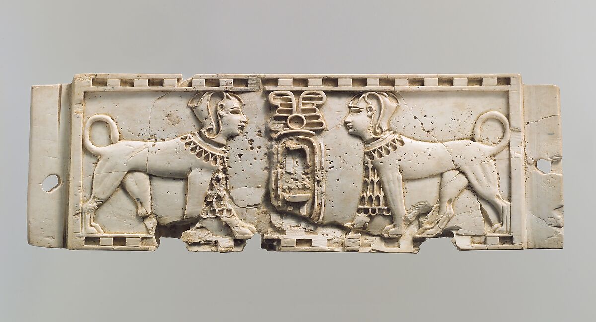 Cloisonné furniture plaque with two sphinxes flanking a cartouche, Ivory, Assyrian 