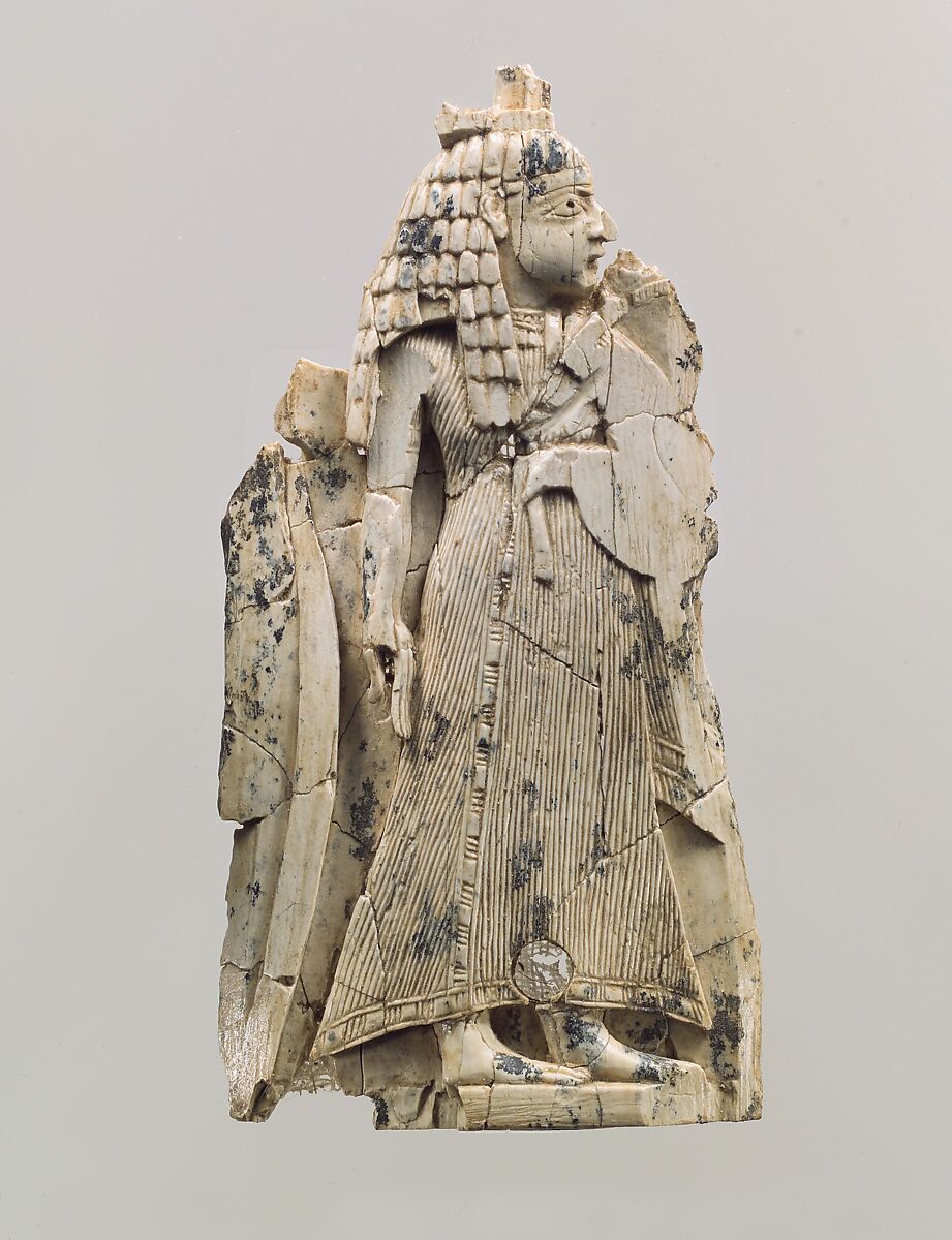 Furniture plaque carved in relief with a female figure, Ivory, Assyrian 