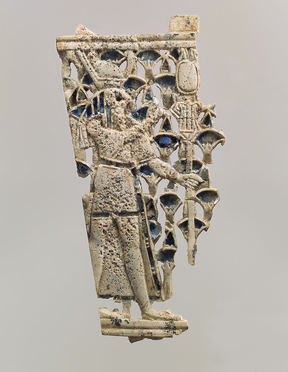Openwork furniture plaque with a falcon-headed figure in a papyrus thicket, Ivory, Assyrian 