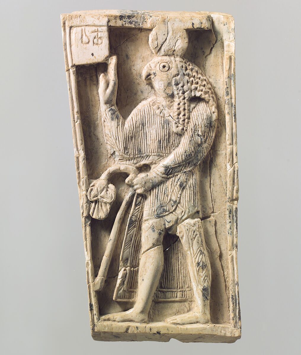 Furniture plaque carved in relief with a falcon-headed figure, Ivory, Assyrian 