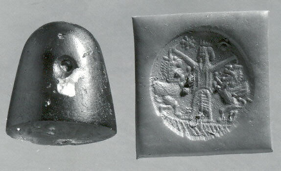 Conoid stamp seal: king mastering two rearing lion-griffins, star and reversed crescent with sun-disc