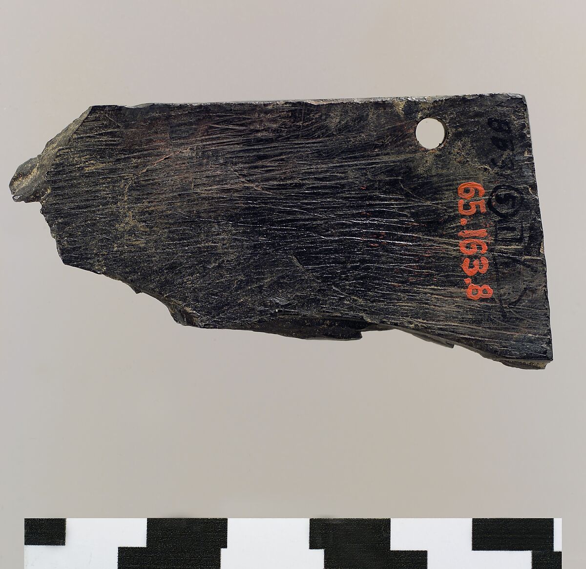 Furniture plaque carved in relief with warrior, Ivory, Iran