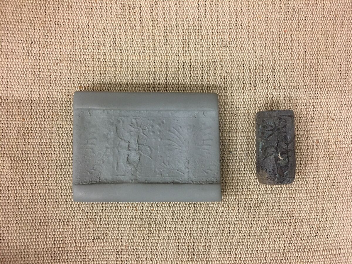 Cylinder seal with animal and divine symbols, Egyptian Blue, Assyrian