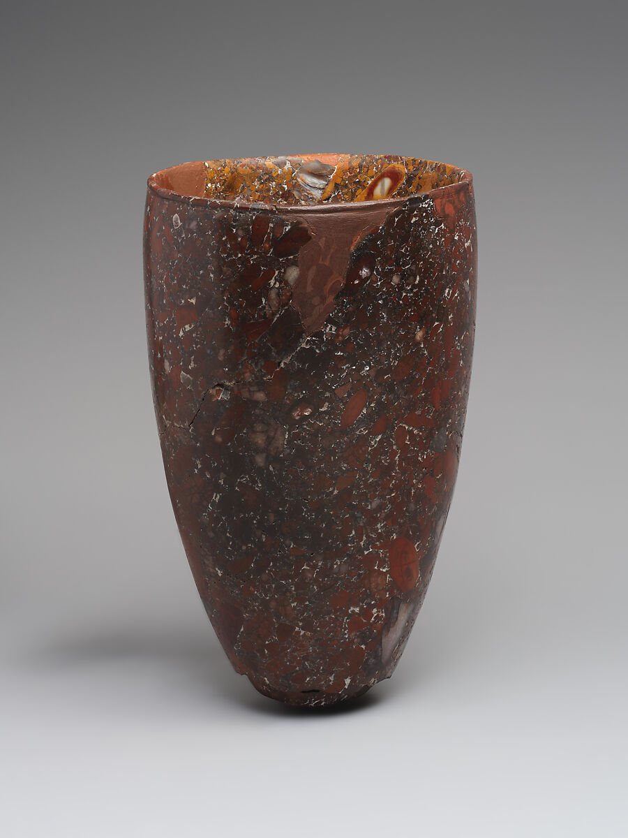 Beaker with bronze pin in base, Jasper conglomerate, bronze, Iran