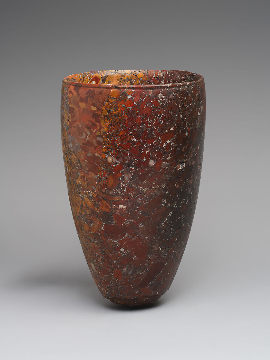 Beaker with bronze pin in base, Jasper conglomerate, bronze, Iran