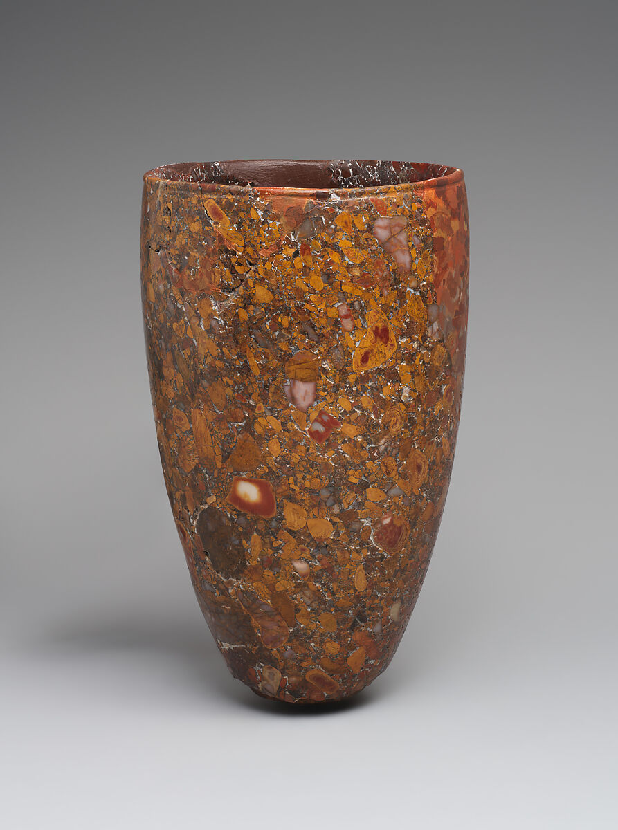 Beaker with bronze pin in base, Jasper conglomerate, bronze, Iran
