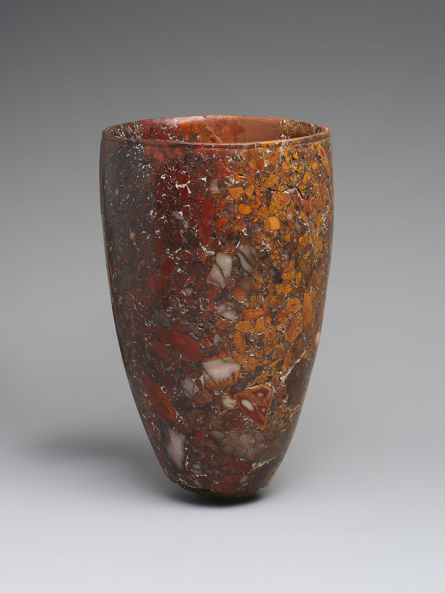 Beaker with bronze pin in base, Jasper conglomerate, bronze, Iran 