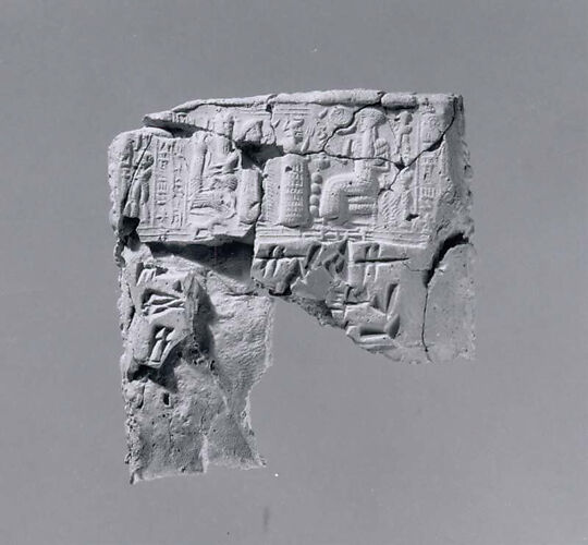 Cuneiform tablet case impressed with four cylinder seals