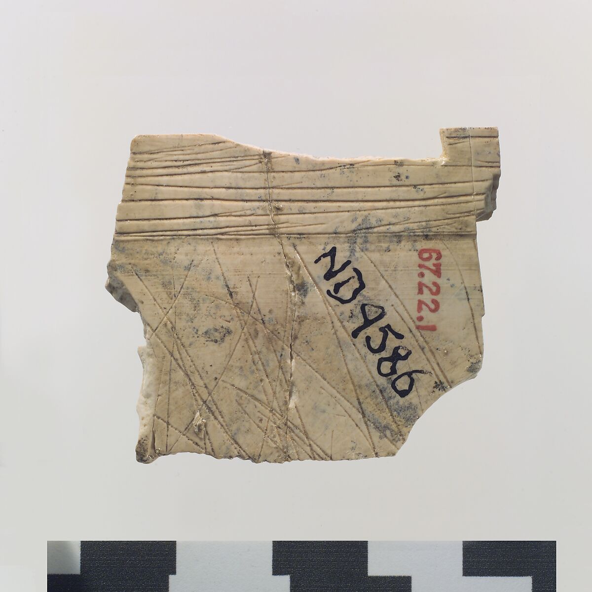 Cloisonné furniture plaque with a figure holding a sword, Ivory, Assyrian