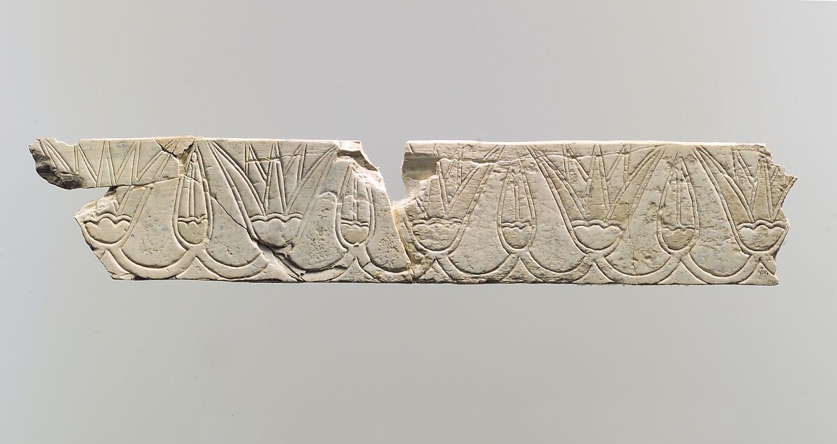 Incised furniture plaque with a frieze of lotus blossoms and buds, Ivory, paint traces, Assyrian 