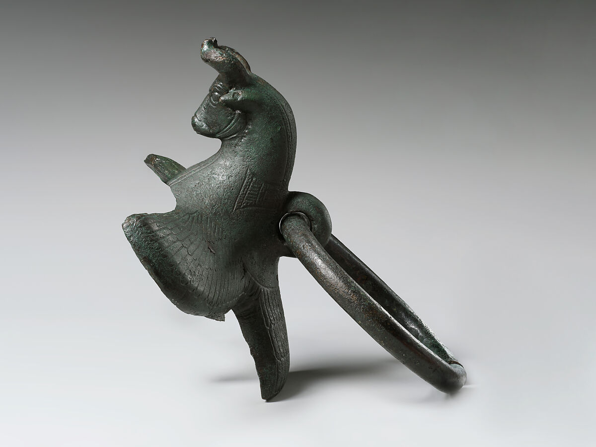 Cauldron attachment: winged bull's head, Bronze, Iran 