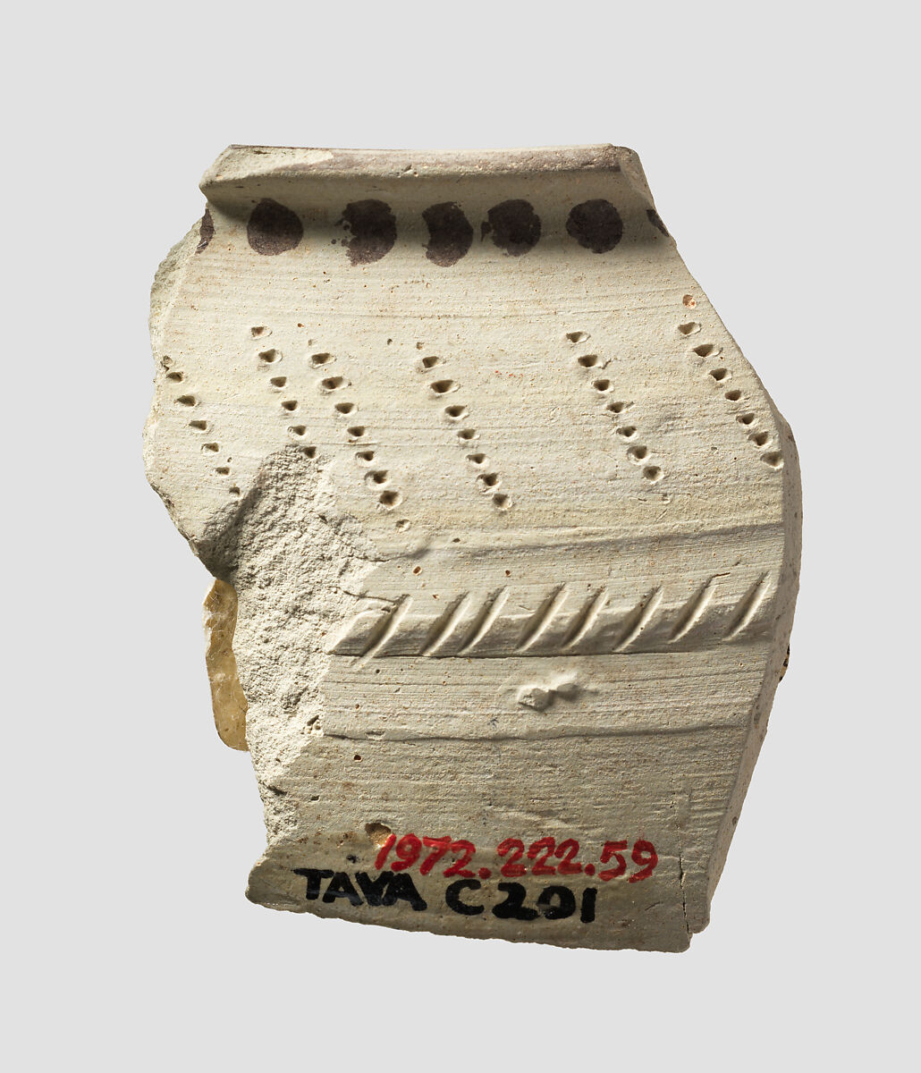 Bowl rim sherd with comb impressions, Ceramic, bitumem 