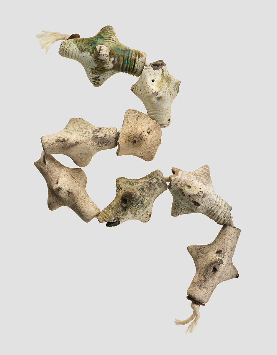 Sixteen beads, Faience, glaze, Iran 