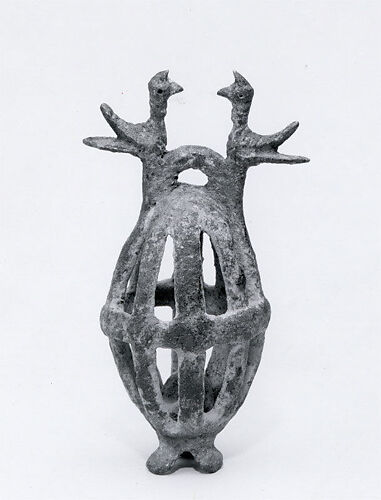 Openwork rattle bell