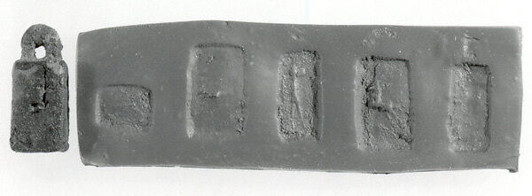 Stamp seal (cubical with loop handle) with anthropomorphic and animal figures
