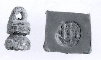 Stamp seal (two-tiered bell with loop handle) with monster, Copper/bronze alloy, Urartian 