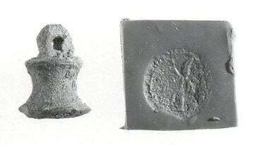 Stamp seal (bell-shaped with loop handle) with divine being, Copper/bronze alloy, Urartian 