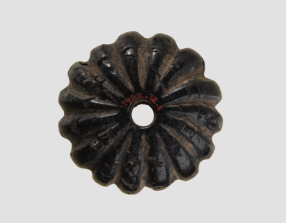 Pommel or large bead, Bitumenous limestone