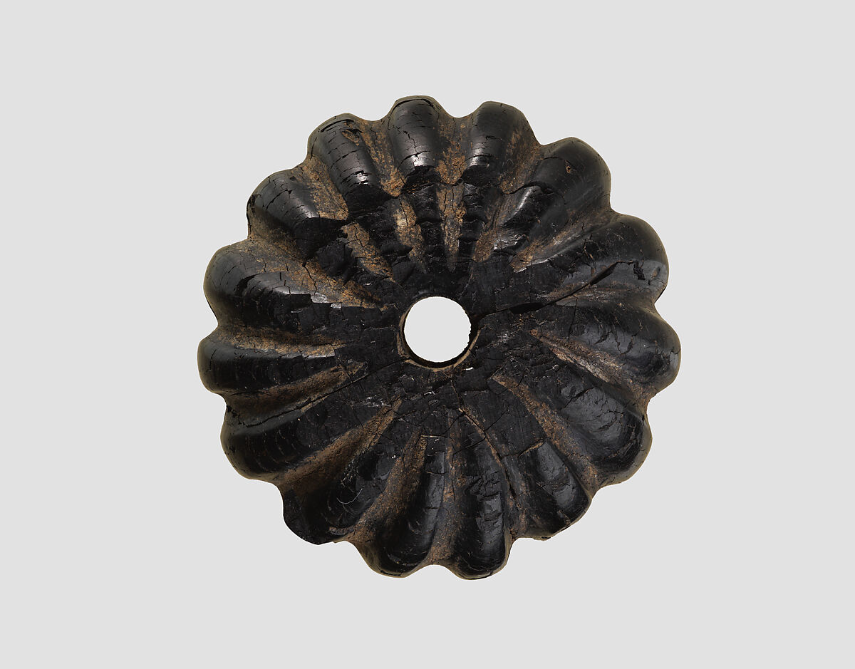 Pommel or large bead, Bitumenous limestone, Iran 