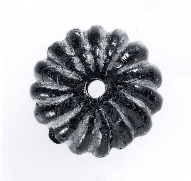 Pommel or large bead, Bitumenous limestone, Iran 