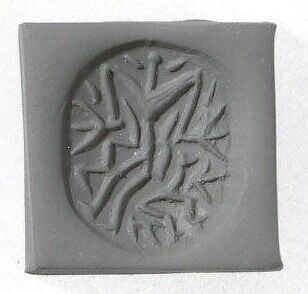 Carinated hemispheroid seal, Chlorite or steatite, brown-black