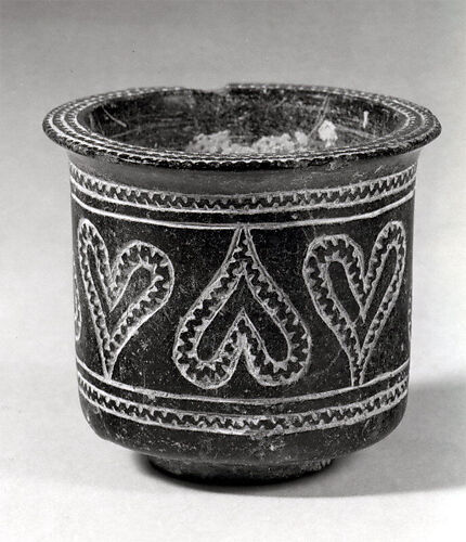 Cup with incised decoration