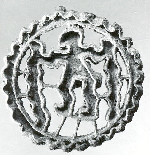 Openwork stamp seal: figure holding snakes