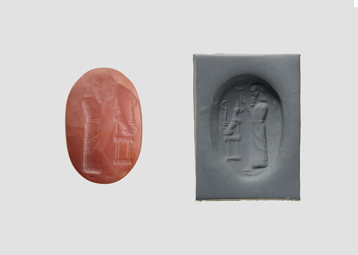 Stamp seal (oval conoid) with cultic scene, Flawed pink Carnelian (Quartz), Assyro-Babylonian 