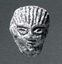 Ornament: male head, Glass 
