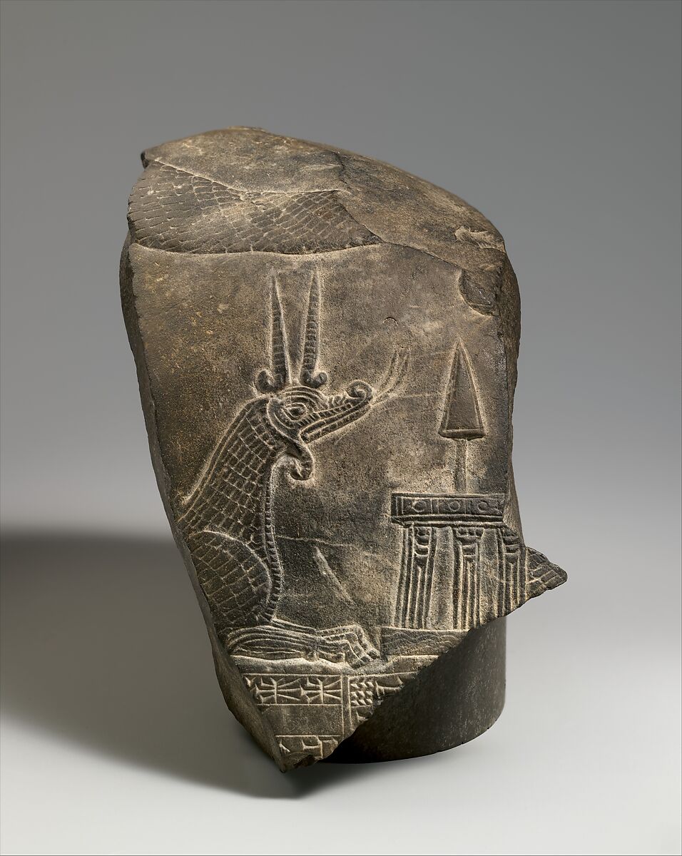 Top fragment of a kudurru with a mushhushshu dragon and divine symbols, Limestone 