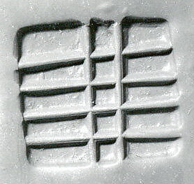 Loop-handled rectangular stamping device, Chlorite or steatite, black 