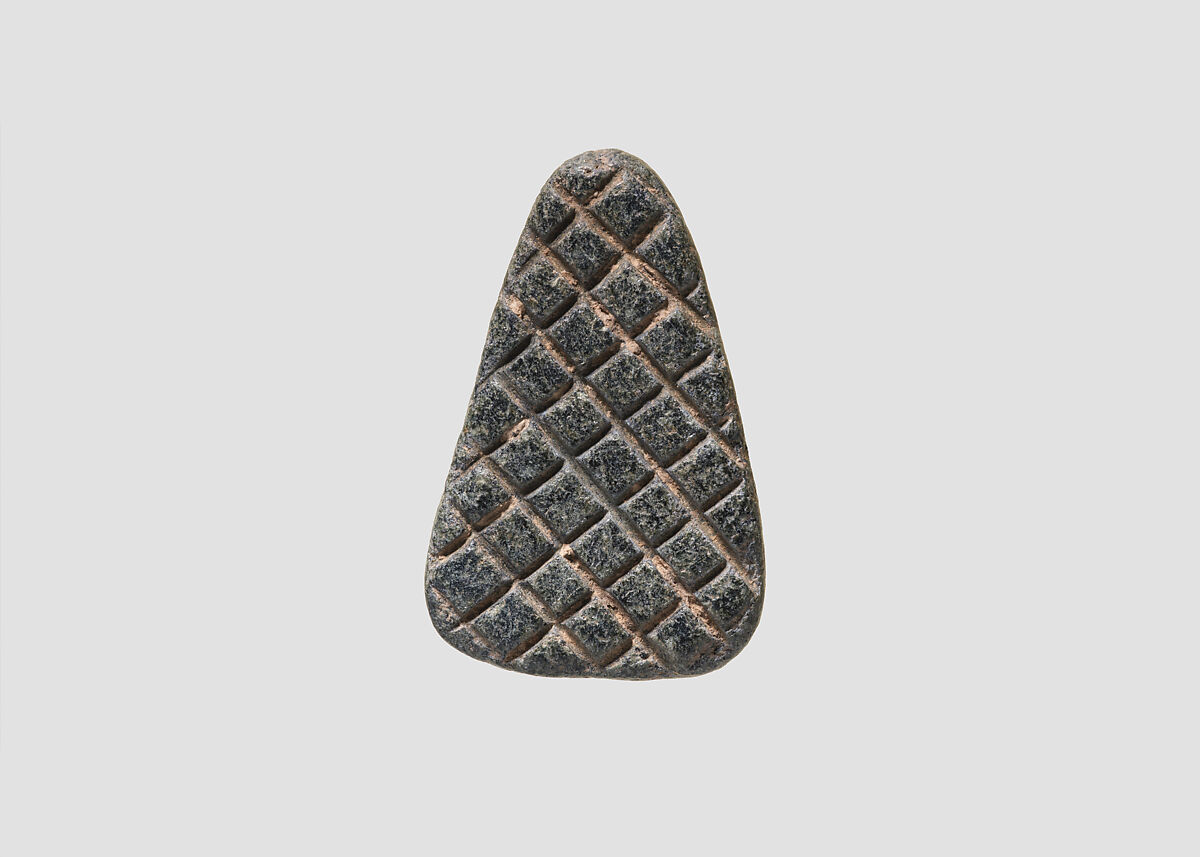 Loop-handled wedge shaped stamping device, Chlorite or steatite, black