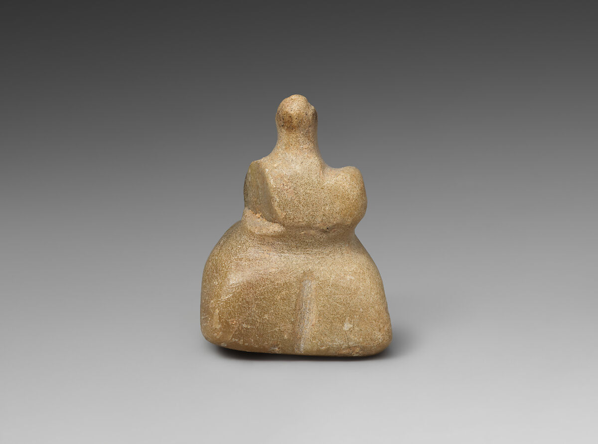 Seated female, Talc