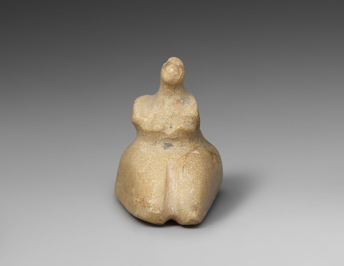 Seated female, Talc