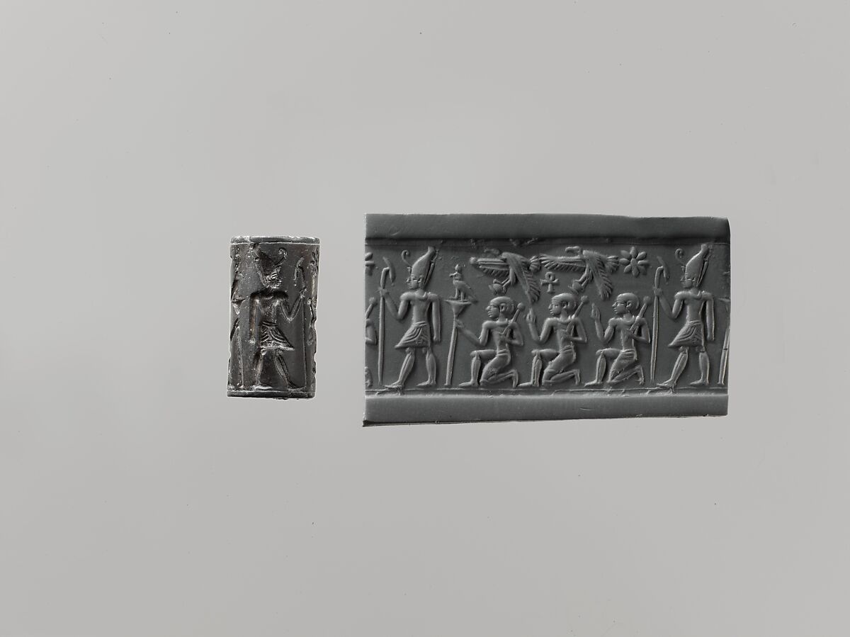 Cylinder seal and modern impression: pharaoh wearing Double Crown, kneeling figures below vultures holding shn symbols; ankh, Hematite 