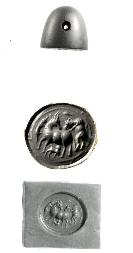 Conoid stamp seal: lions (?) attacking cow suckling calf, Hematite, copper alloy tube in string hole 