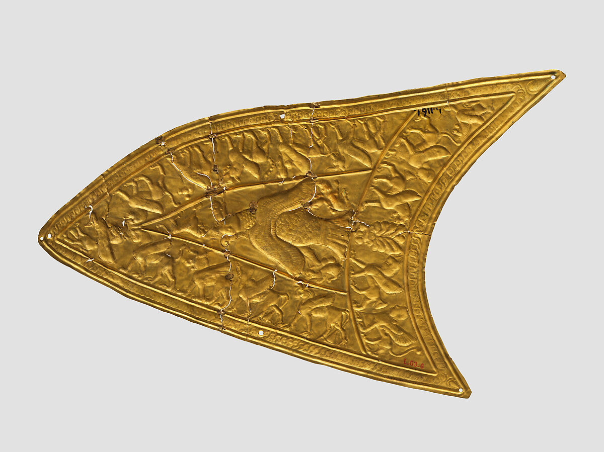 Plaque with a bird of prey and winged beasts, Gold, Iran