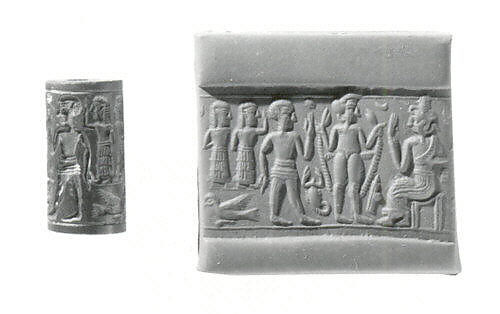 Cylinder seal and modern impression: nude goddess before seated deity, Hematite 
