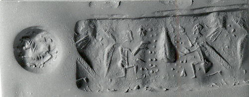 Stamp-cylinder seal (with loop handle) with cultic scene, Variegated gray and black Steatite, Urartian 