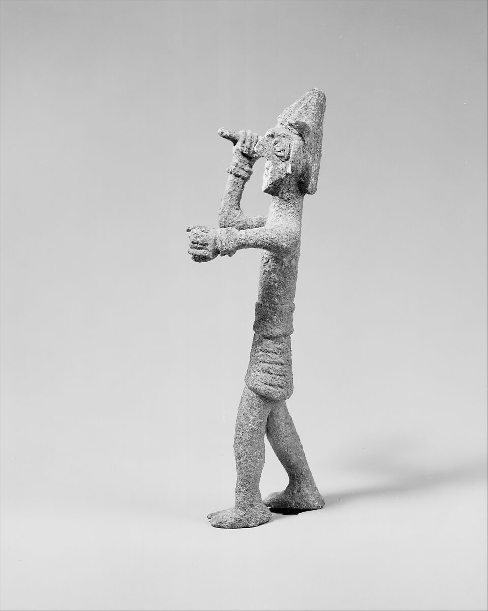 Smiting weather god or warrior with horned headgear, Bronze, Canaanite 