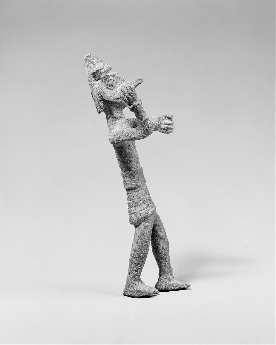 Smiting weather god or warrior with horned headgear, Bronze, Canaanite