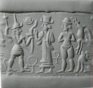 Cylinder seal and modern impression: smiting weather god before a Syrian goddess, nude goddess; ankh symbols