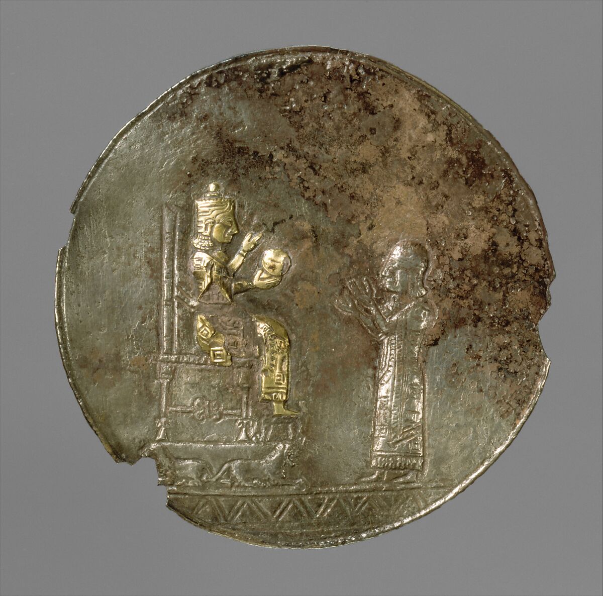 Medallion with a seated deity and a male worshiper, Silver, gold foil, Urartian 