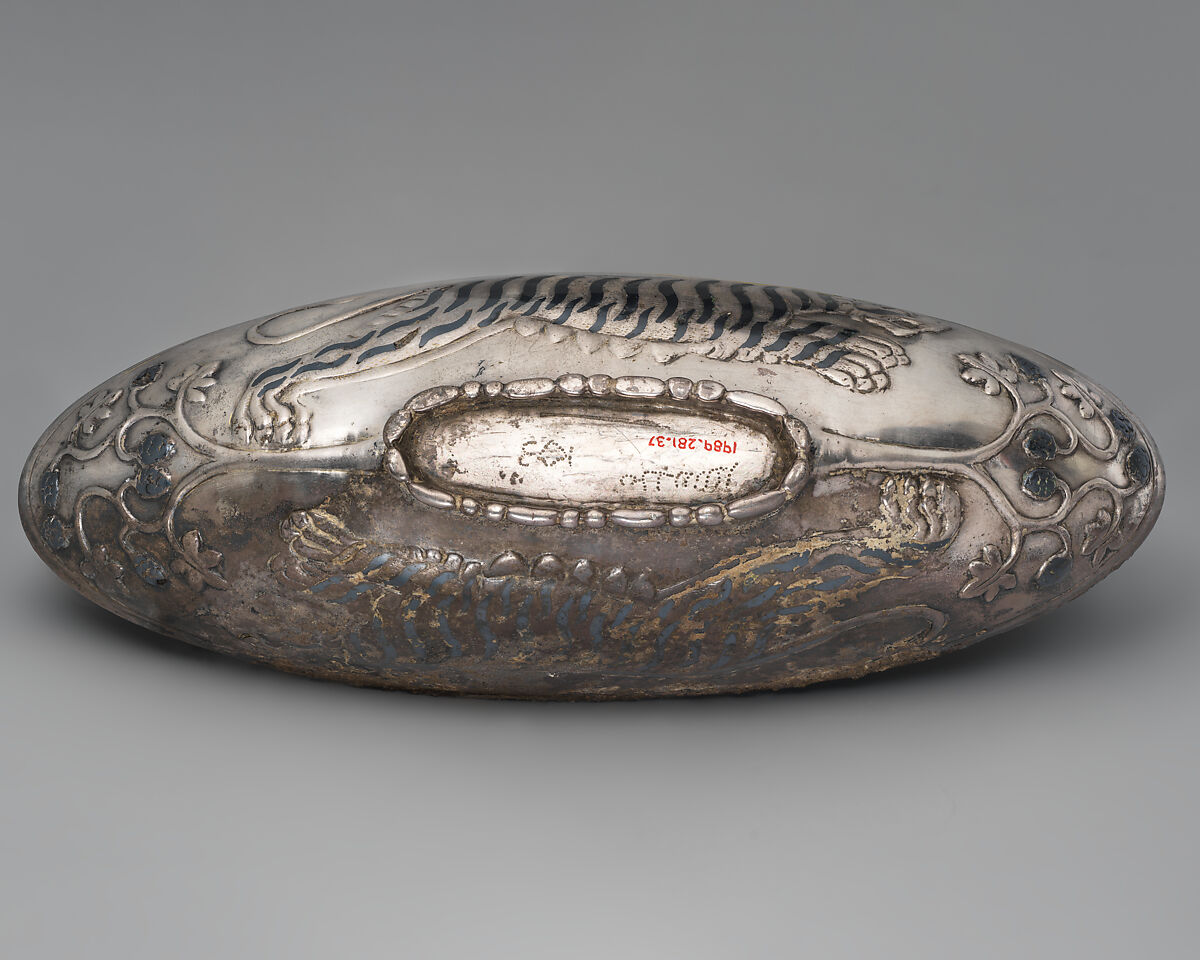 Oval bowl with running tigresses on each side, Silver, niello inlay, Sasanian