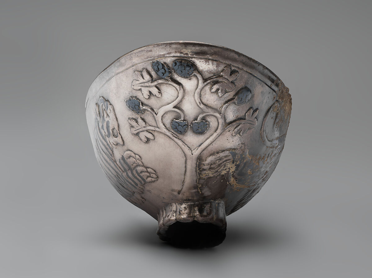 Oval bowl with running tigresses on each side, Silver, niello inlay, Sasanian